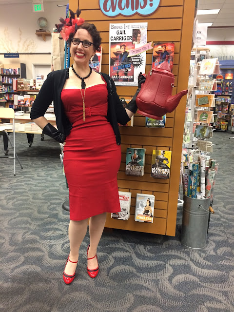 In Red & Black Pencil Dress in Alameda for the Launch of Reticence 
