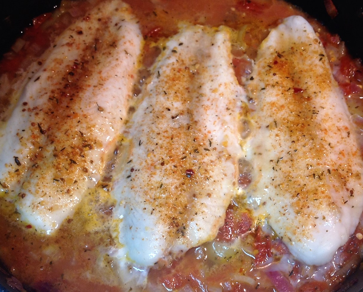 The Left Chapter Poached White Fish in a Spicy Tomato Pepper Sauce