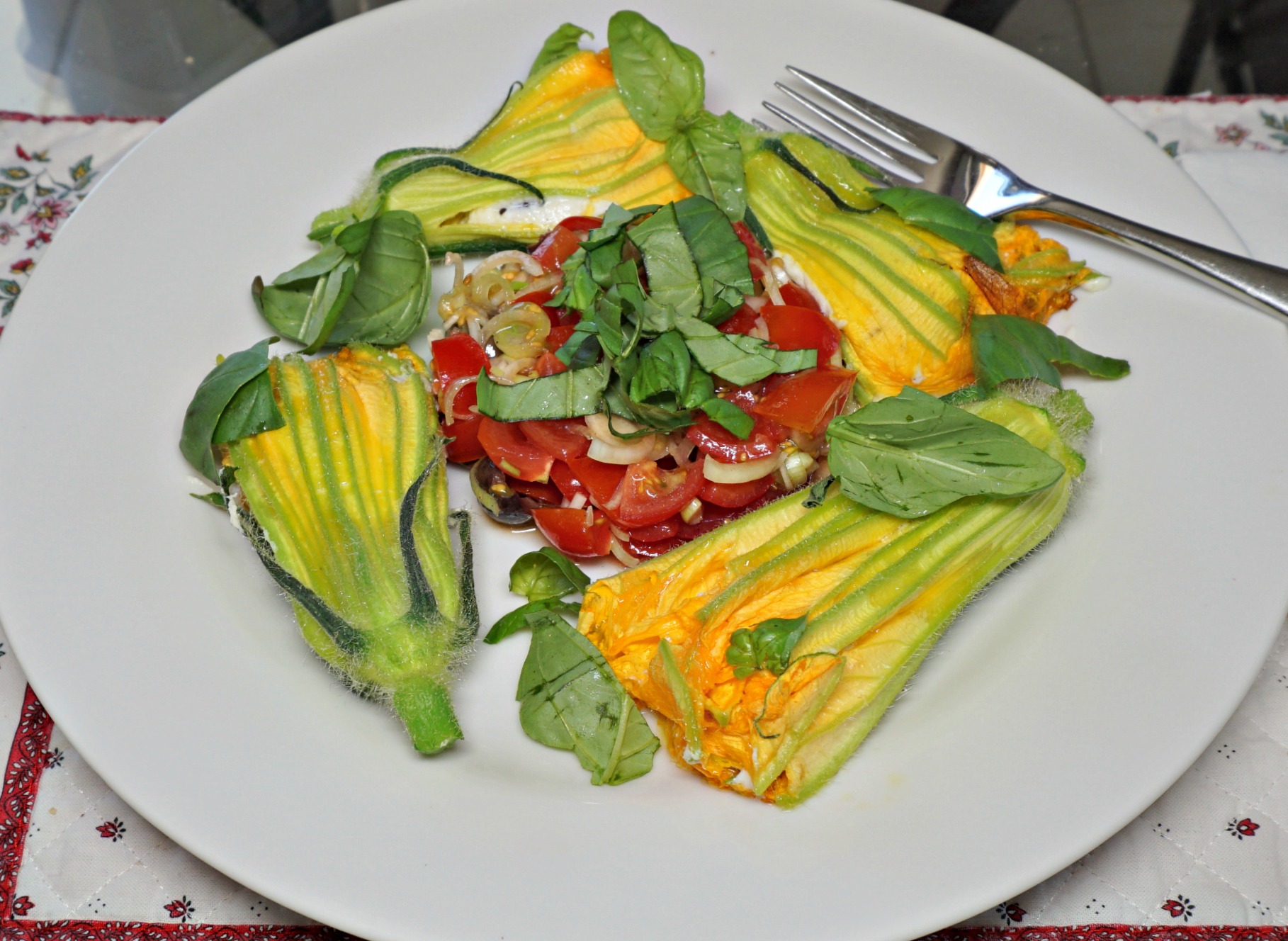 Zucchini blossoms stuffed with ricotta, parmesan and black olives