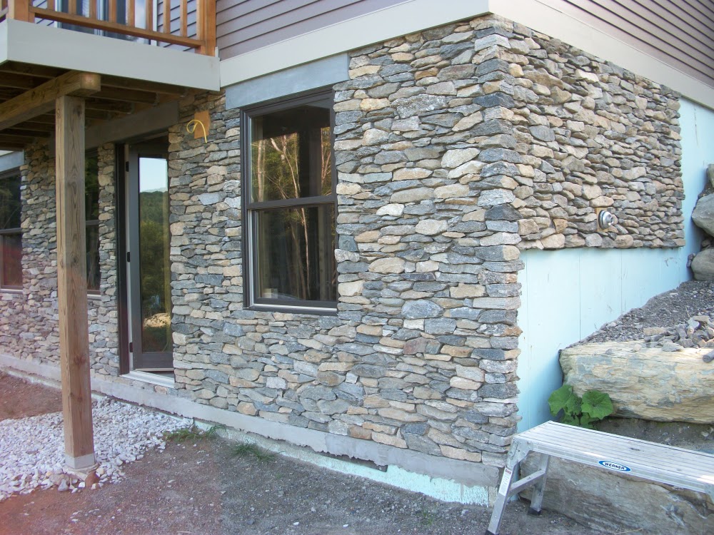 Michael Thronson Masonry Thin stone veneer projects and custom hearth
