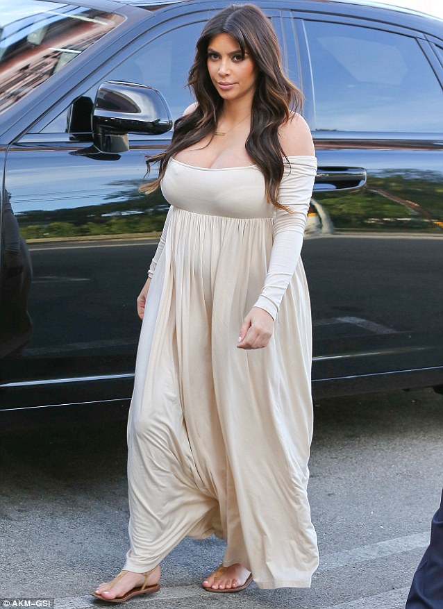 Pregnant Kim Kardashian Busting Out In A Very Revealing Maxi Dress This Is Kiyo And Filo Blog