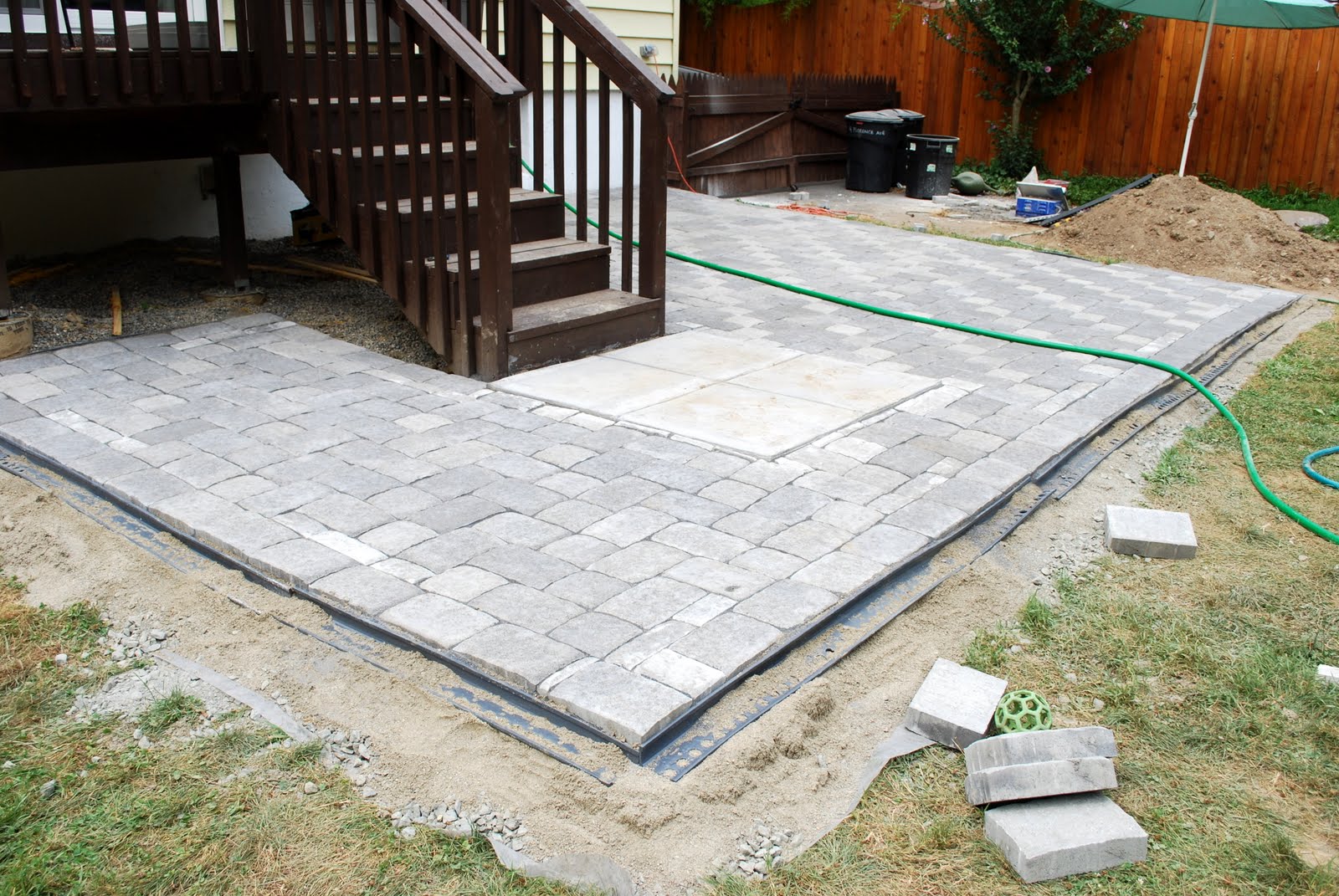 In the Little Yellow House Patio Building Filling the Gaps