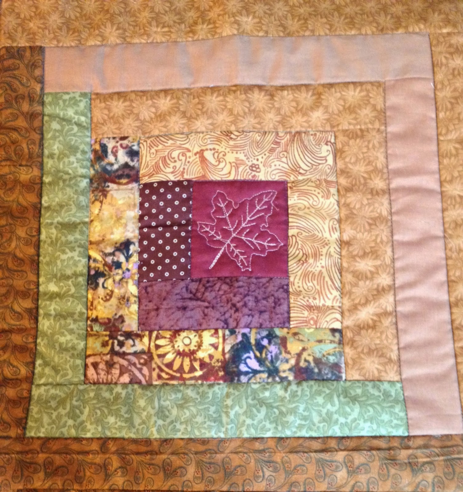 Quilt as you go using free motion quilting Joining quilted log cabin