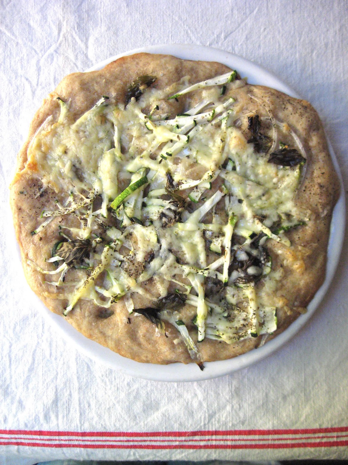 she's in the kitchen zucchini focaccia with fresh oregano leaves and