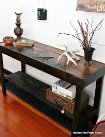 entry table made with barn wood and pallets and fence boards