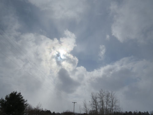 sun through clouds in winter