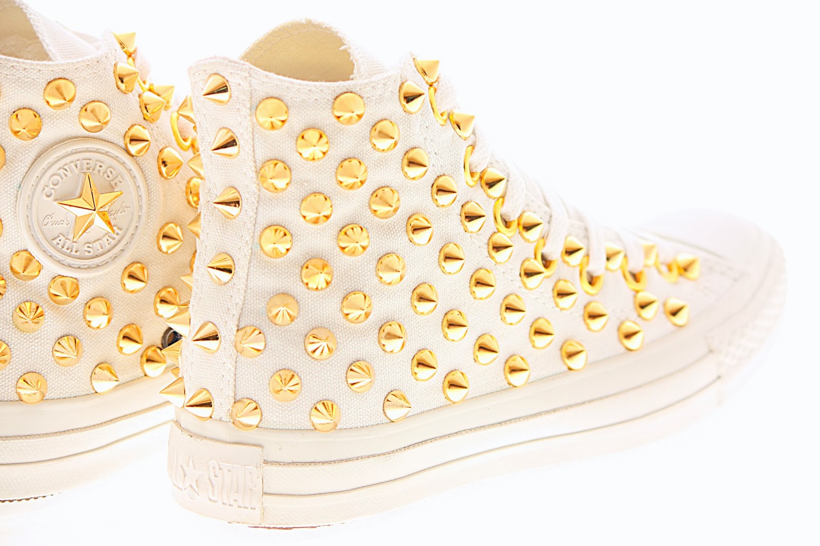 white converse with gold studs