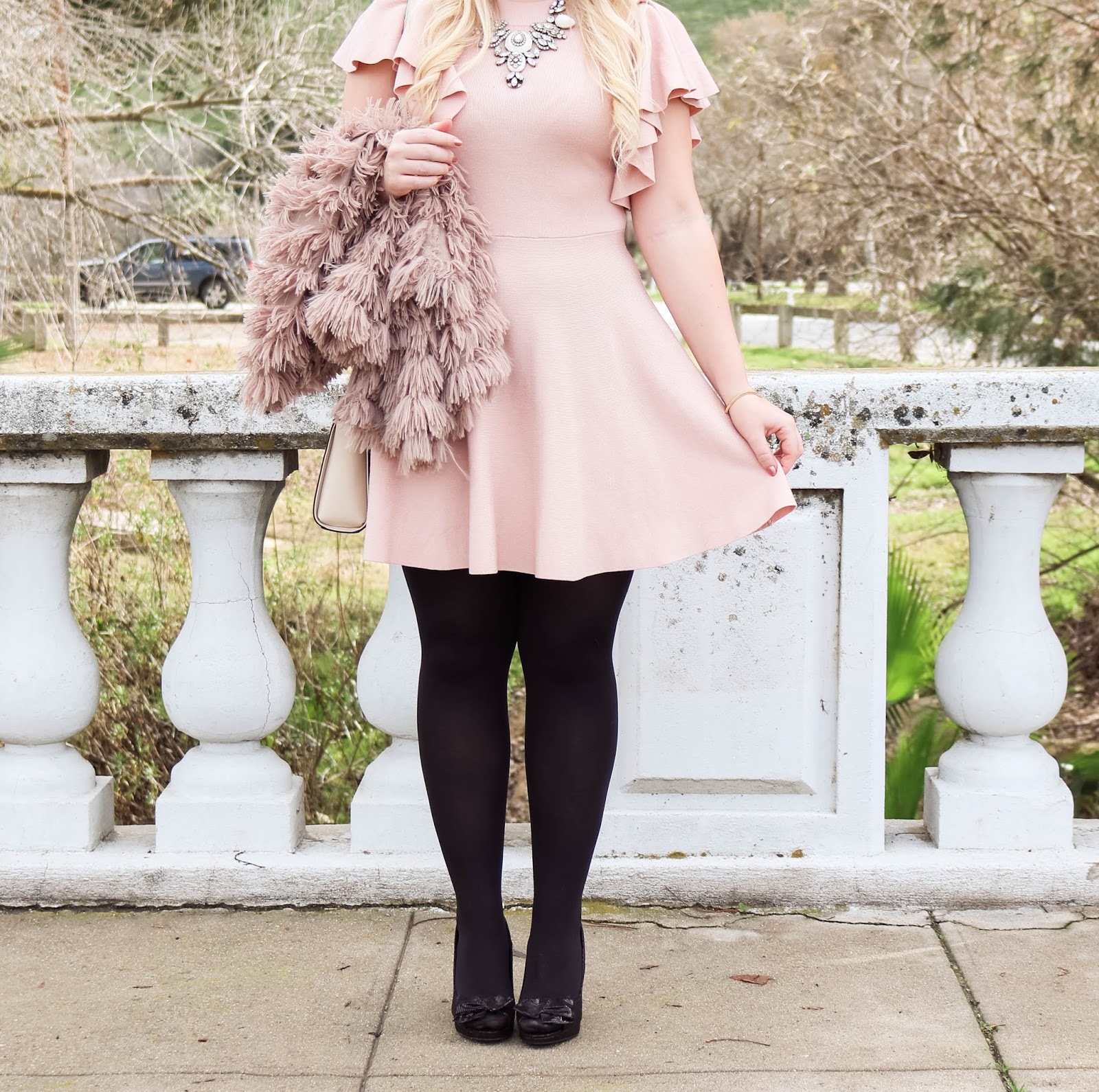 Feminine fashion blogger Lizzie in Lace shares a Pink and Black Outfit for Valentine's Day