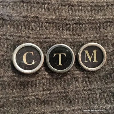 my initials spelled out in typewriter keys, worn on my sweater