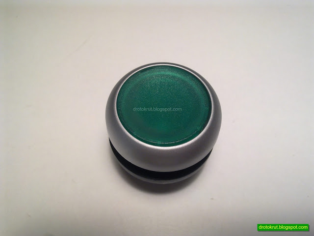 Зеленая плоская головка кнопки с подсветкой и фиксацией Eaton M22-DRL-G серии Moeller RMQ-Titan
