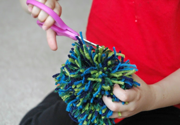 Planet Earth Pom-Poms.  Earth Day craft for kids.