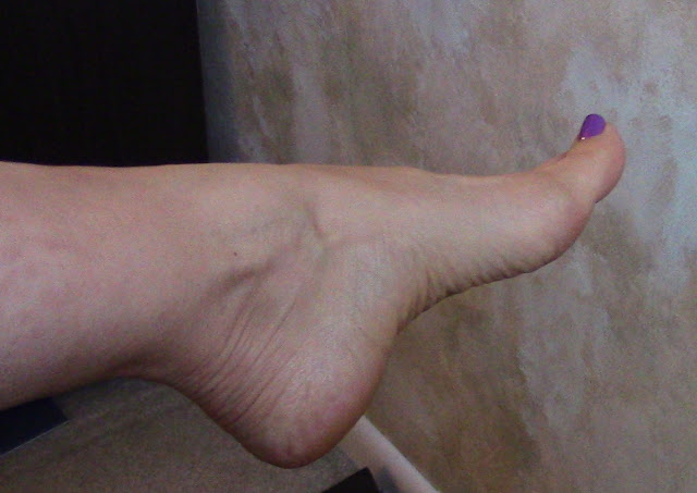 foot-with-purple-polish