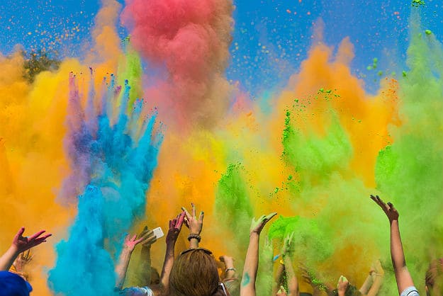 why we celebrate holi in english