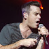La confesión de Robbie Williams: "Soy mitad homosexual"