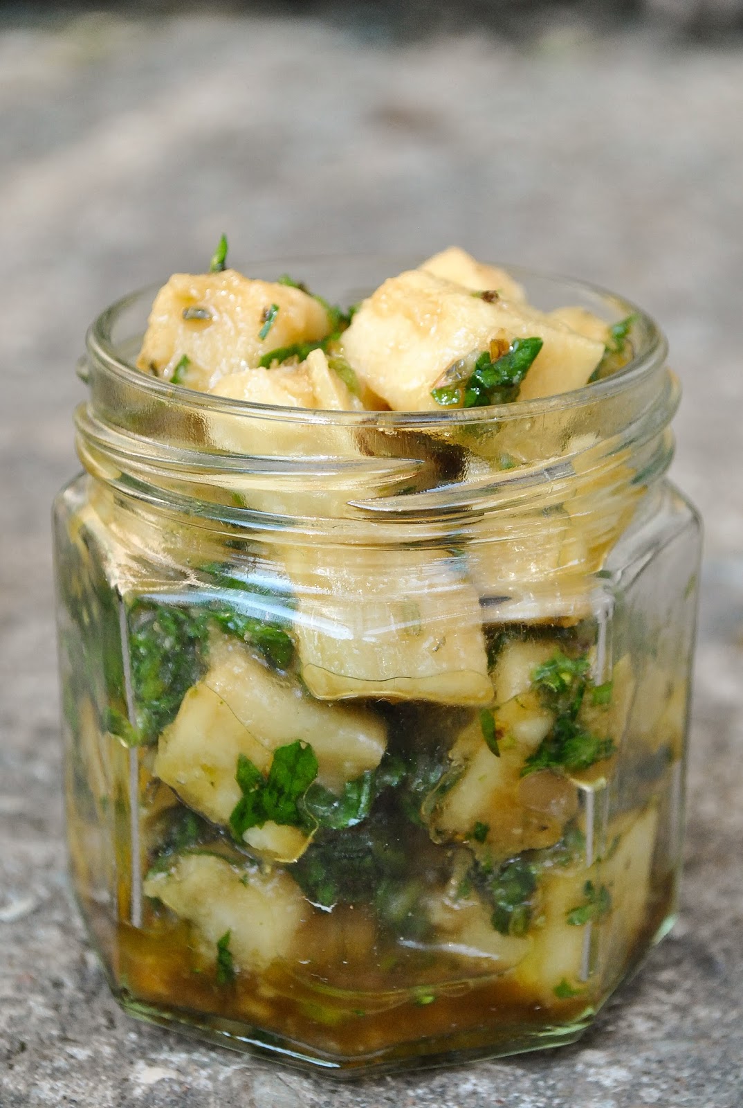 Homemade vegan cheese cubes in a herb marinade VeganSandra