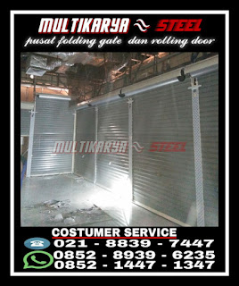 Gambar CV.MultikaryaSteel pusat penjualan segala jenis Rolling Door, Rolling Door One Sheet jenis solid semi dan full perforated, Rolling Door Industri sistem otomatis dan manual, Rolling Door slat daun besi aluminium dan galvalum, rolling door perforated, rolling door bolong bolong, rolling door transparan, rolling grille stainless steel, rolling grille aluminium, rolling grlle, rolling door motor, rolling door mesin, rolling door automatic, rolling door pvc, folding door, folding gate lipat, pintu harmonika dan pintu besi lipat dorong produk wina dan handerson dengan harga jual paling murah harga per meter persegi M2 Terkirim terpasang terbaru termurah di Awal tahun 2021 Berlaku untuk seluruh wilayah di kab kota sumedang, pangandaran, padalarang, subang, cimahi, cicalengka, pasteur, bekasi, cibitung, tambun, depok, tangerang, karawang, cikampek, garut cianjur tasikmalaya ciamis majalengka bandung dan wilayah jawa barat lainnya. Daftar harga jual beli kami permeter persegi terkirim dan terpasang untuk seluruh wilayah jawa barat. Rolling door one sheet biasa di gunakan untuk pintu pengaman pada kios kios di mall pasar moderen dan fasilitas umum lainnya