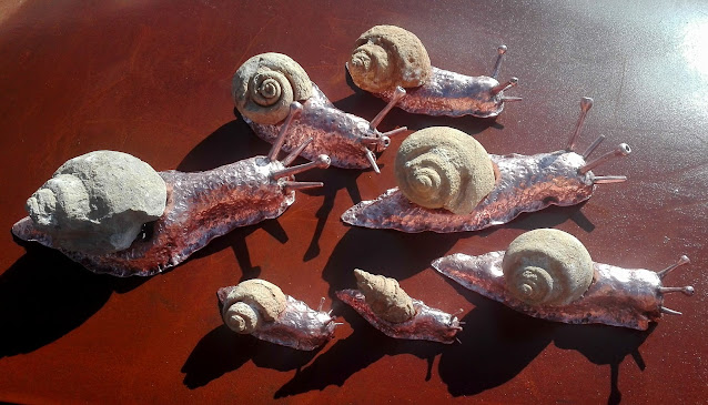 fossil snails sculpture