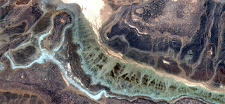 Surrealistic allegory worm that hides in the cracks of the stones of the desert, abstract landscapes of deserts of Africa from the air, collection of Abstract Naturalism Munimara Surrealistic allegory worm that hides in the cracks of the stones of the desert, abstract landscapes of deserts of Africa from the air,