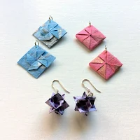 three pairs of origami earrings folded three different ways