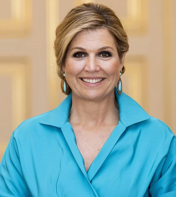 Queen Maxima wore a new blue Taffeta shirt dress from Natan, blue diamond earrings