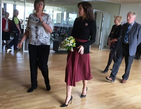 Crown Princess Mary of Denmark visited the Svanevig Hospice in Bandholm, The Crown Princess wore Gianvito Rossi shoes, Prada coat