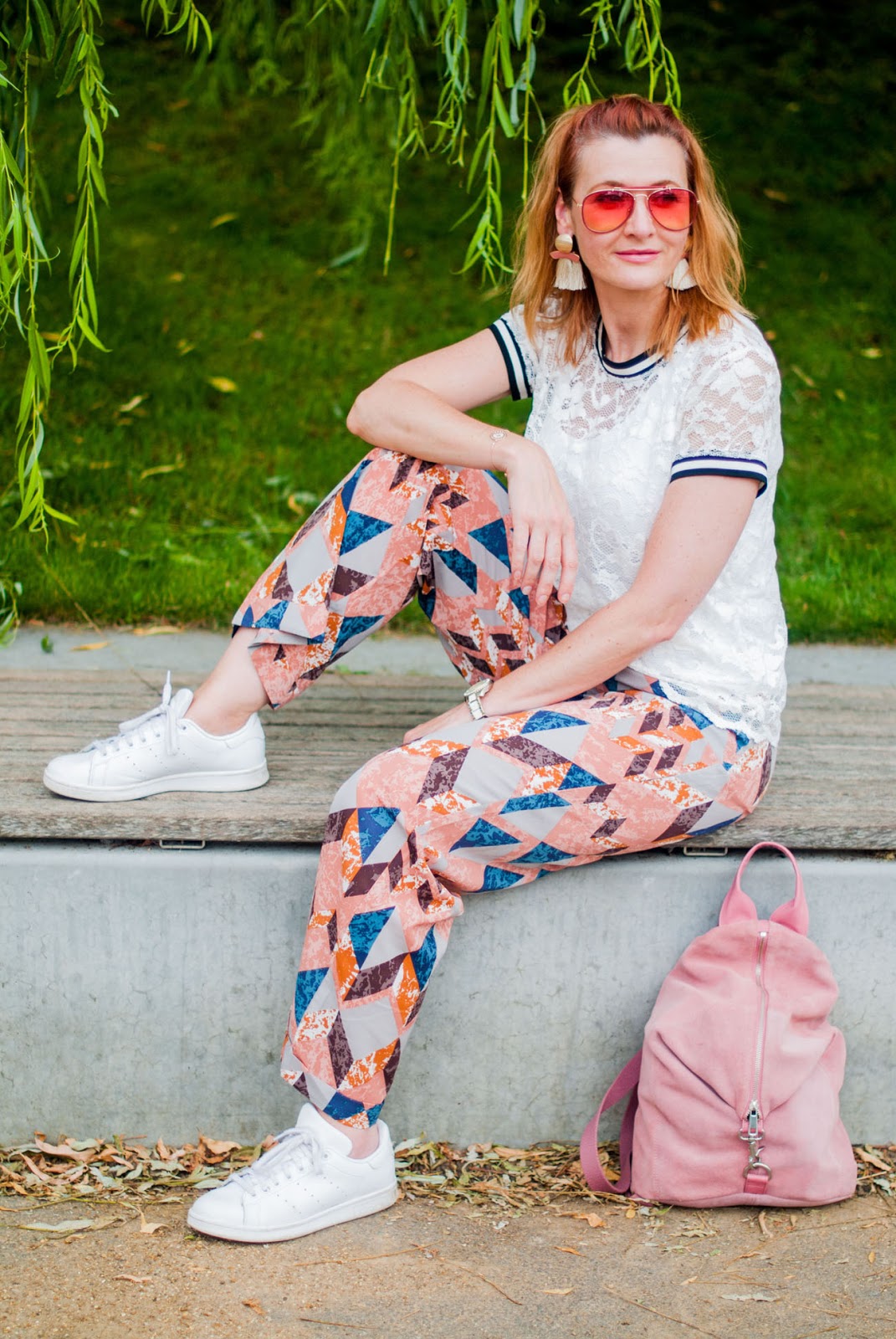 Bold, colourful summer dressing: White lace top pyjama-style patterned trousers pants white Stan Smiths statement tassel earrings orange aviators pink suede backpack | Not Dressed As Lamb, over 40 style blog Bold, colourful summer dressing: White lace top pyjama-style patterned trousers pants white Stan Smiths statement tassel earrings orange aviators pink suede backpack | Not Dressed As Lamb, over 40 style blog