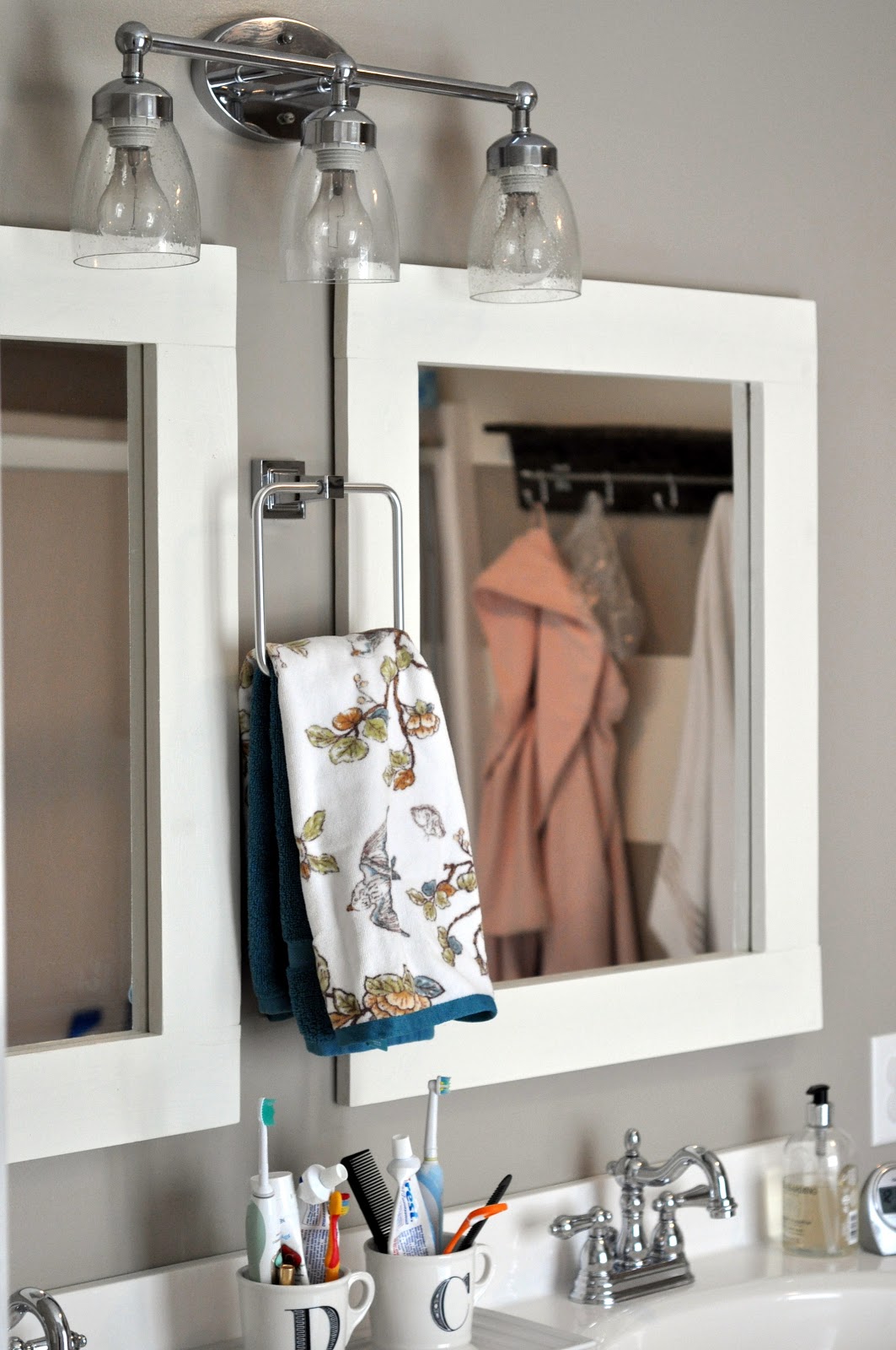 made Master Bathroom Update {DIY Shelving + Mirrors}
