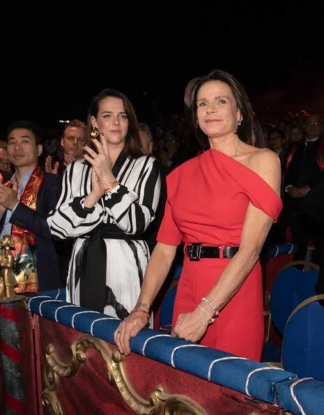 Princess Stephanie of Monaco, Pauline Ducruet, Louis Ducruet and his wife Marie Ducruet. red one-shoulder jumpsuit half sleeve