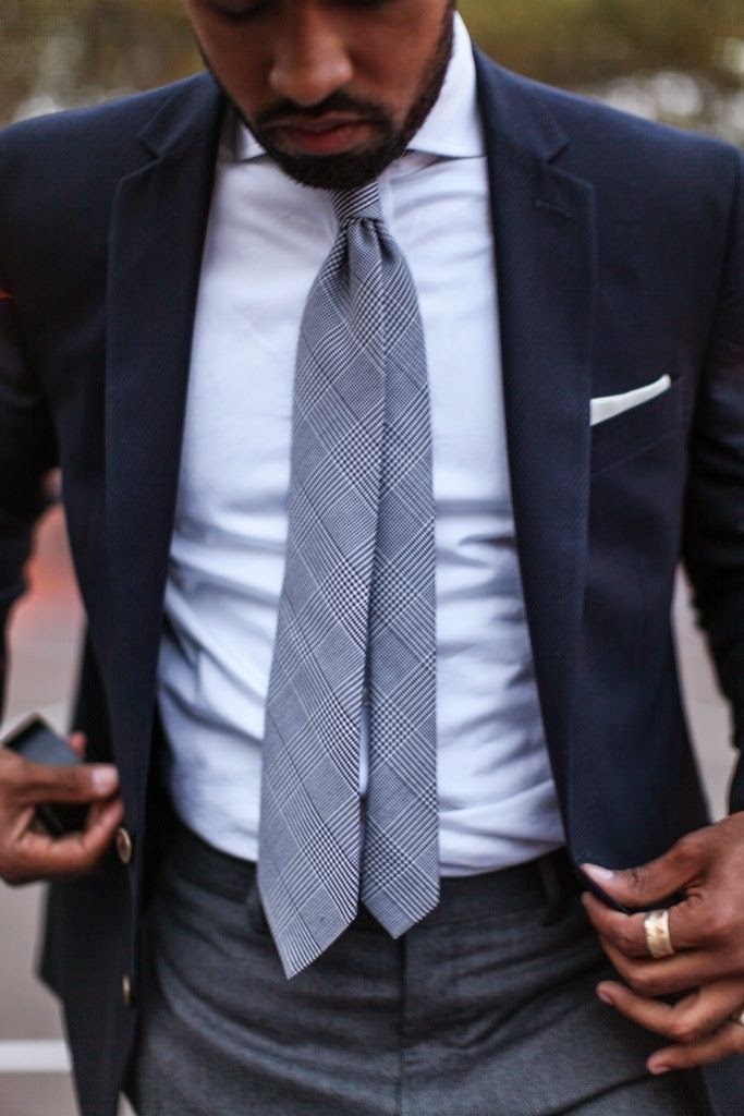 navy blue shirt and grey pants