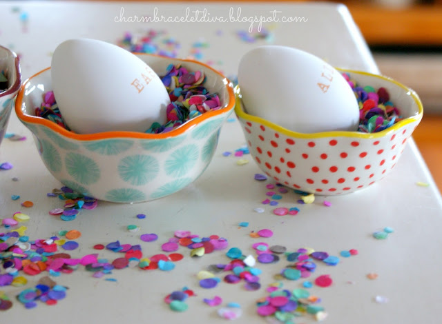 Hand stamped Easter eggs in Pioneer Woman measuring cups confetti
