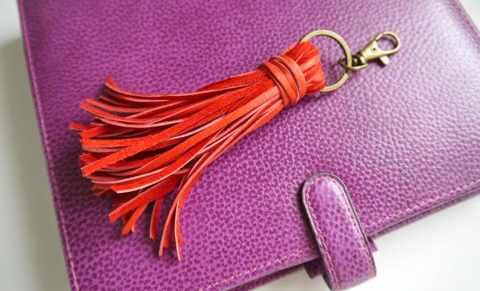 http://www.makery.uk/2015/02/diy-leather-tassle-key-fobbag-charm/