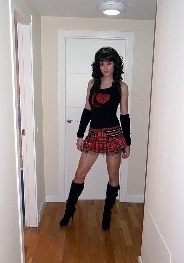 I think that her red tartan mini skirt is super hot, paired with her black ...
