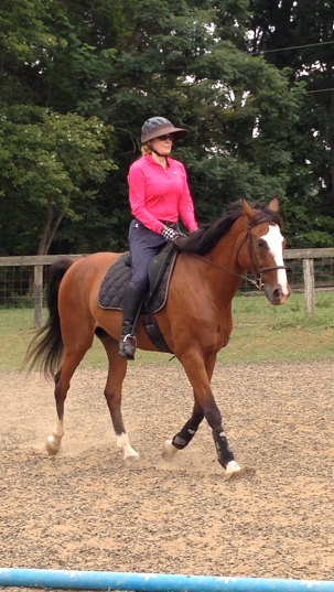 2015 Laura and Kiddo are trail riding off site and working on Intro Level Dressage!