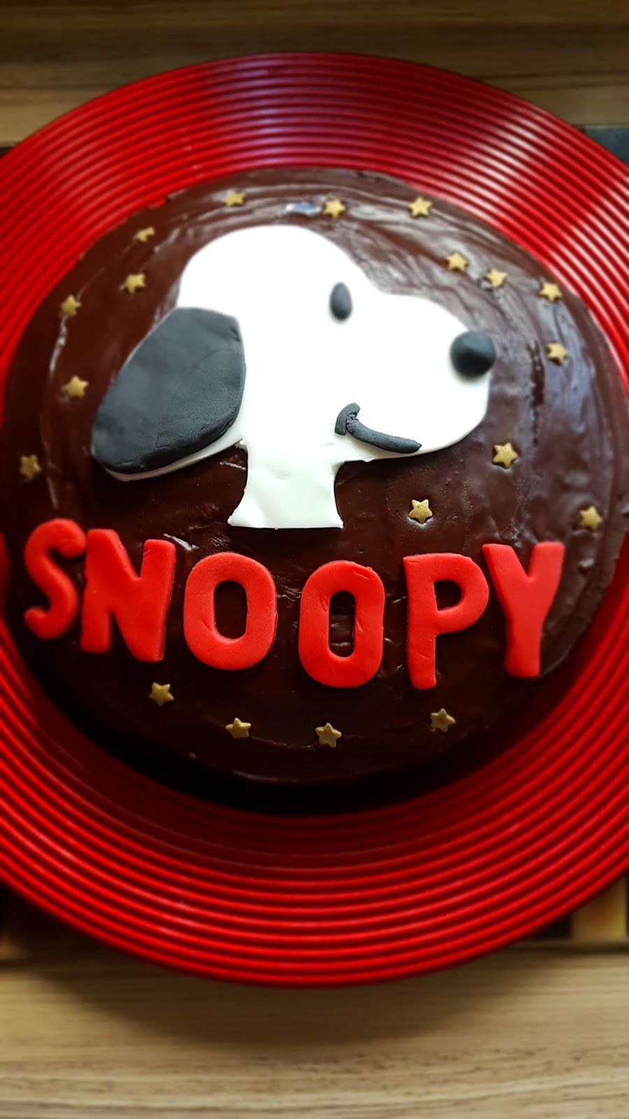 Chocolate Snoopy themed birthday cake