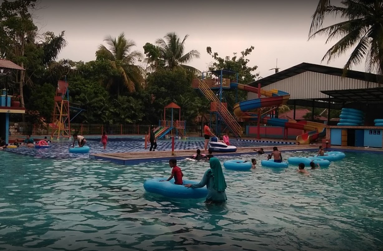 Kolam Renang & Taman Wisata Paggora
