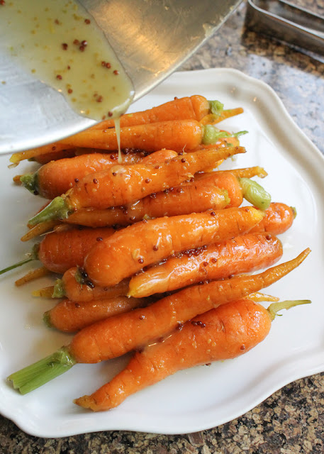 Food Lust People Love: Mustard Honey Buttered Carrots are slightly sweet with a lovely sharpness and, of course, shiny with just the right amount rich butter. They make a beautiful side dish, served hot or at room temperature.