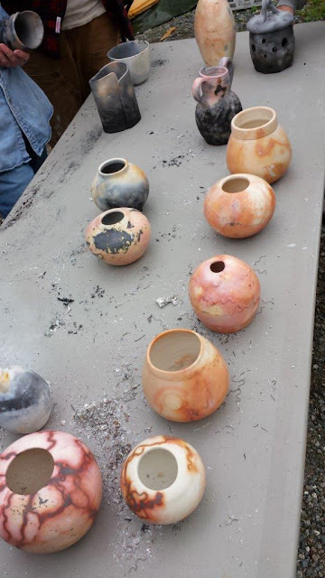 Beautiful pots from the saggar raku pottery firing.
