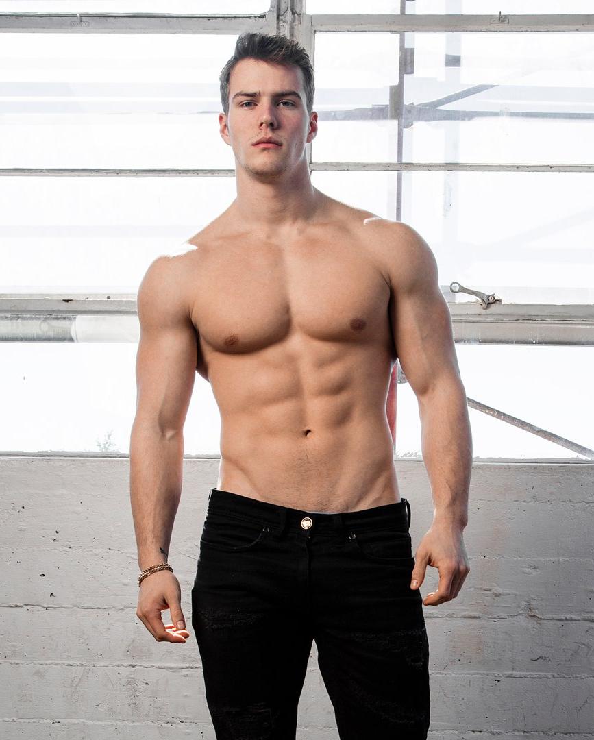sexy-shirtless-beefy-cocky-personal-trainer-michael-dean-johnson-body-dark-jeans