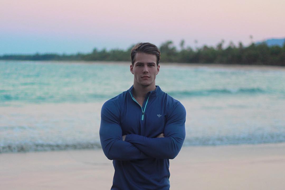 handsome-strong-jawline-guy-blue-muscle-shirt