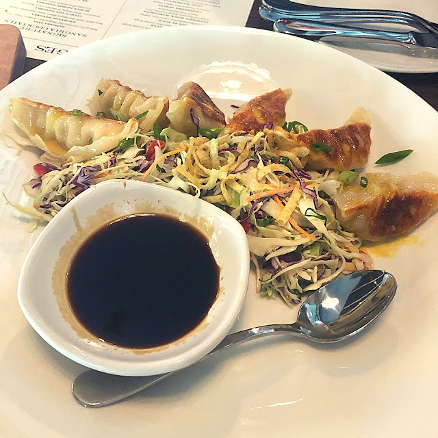 Chicken Potstickers with a vibrant slaw create quite the perfect starter at Cooper's Hawk.