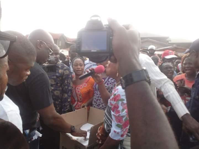 1a3 Fayose gifts an old woman a grinding machine while taking a walk in Ekiti (Photos)