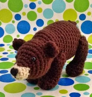 http://www.craftsy.com/pattern/crocheting/toy/winston-the-bear/66261