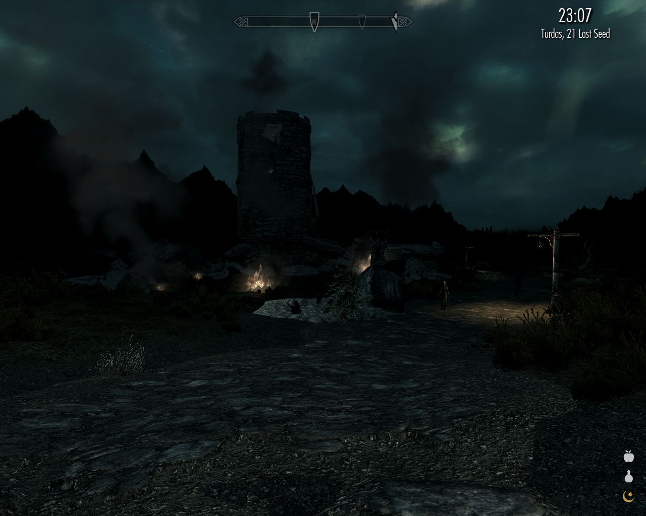 night, cloudy sky, road leading to a citadel with several small smoking fires near it