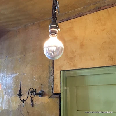 naked light bulb at The David Ireland House in San Francisco, California