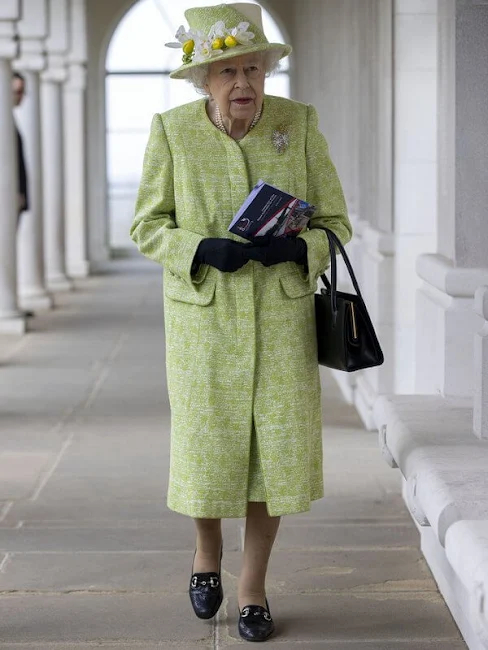 Queen Elizabeth, wearing a lime green coat and the Wattle brooch presented to her on first tour of Australia in 1954