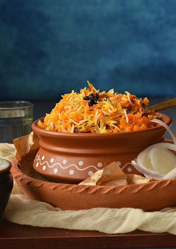 A clay pot served with Pressure Cooker Chicken Biryani