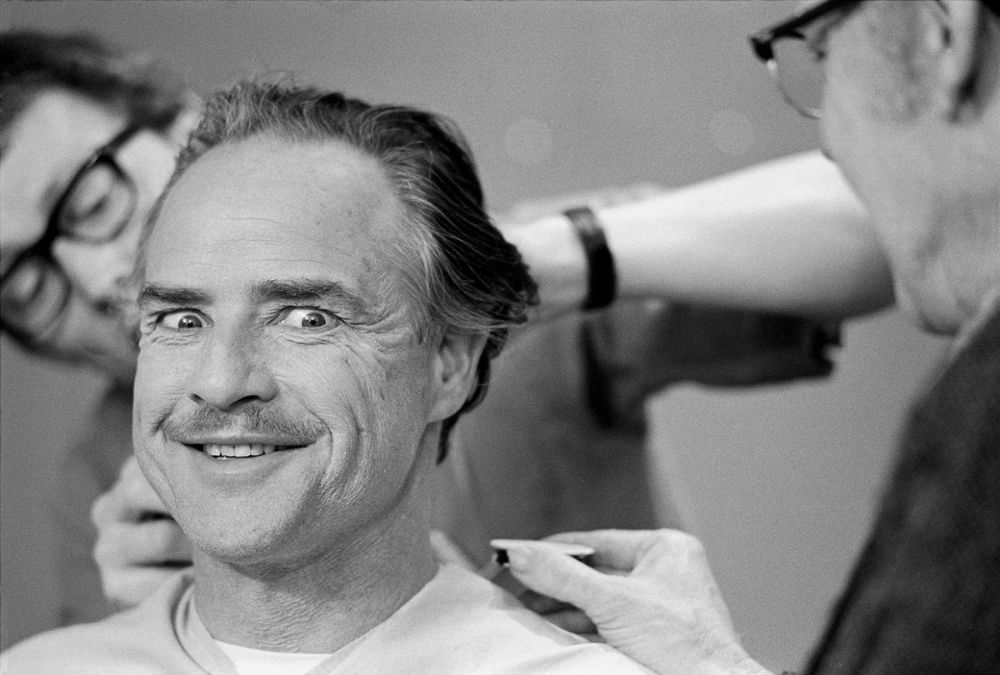 Marlon Brando Before and After Getting His Make Up Done To Be Don Vito Corleone in “The