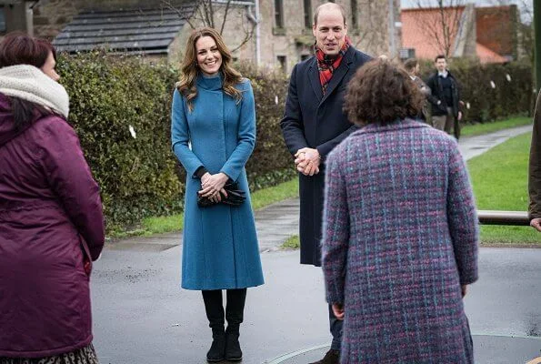 Kate Middleton wore a khaki coat and tartan scarf from Alexander McQueen, and blue coat and black gloves from Catherine Walker. Meghan Markle