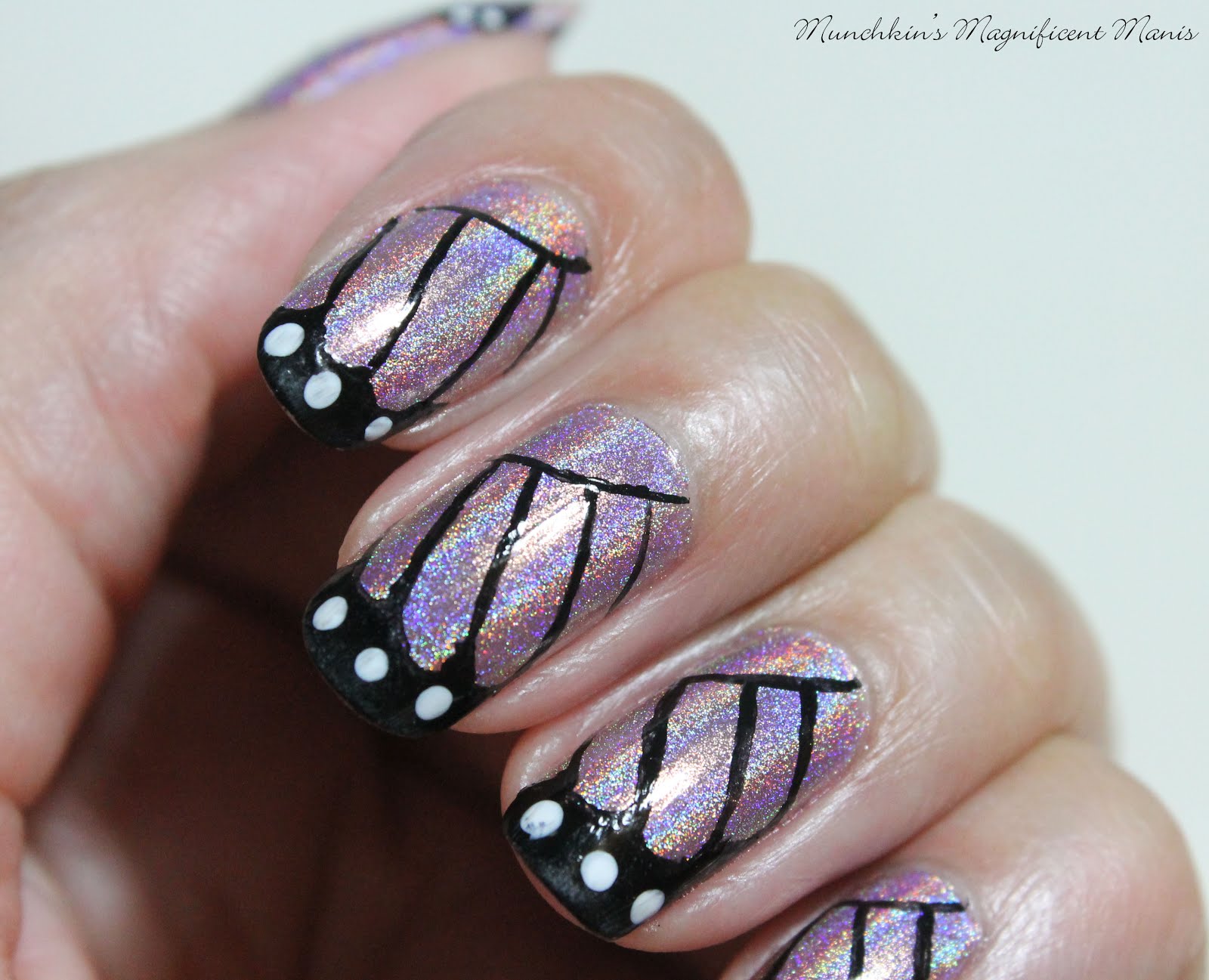 Munchkin’s Magnificent Manis Butterfly Kisses Butterfly Nail Design