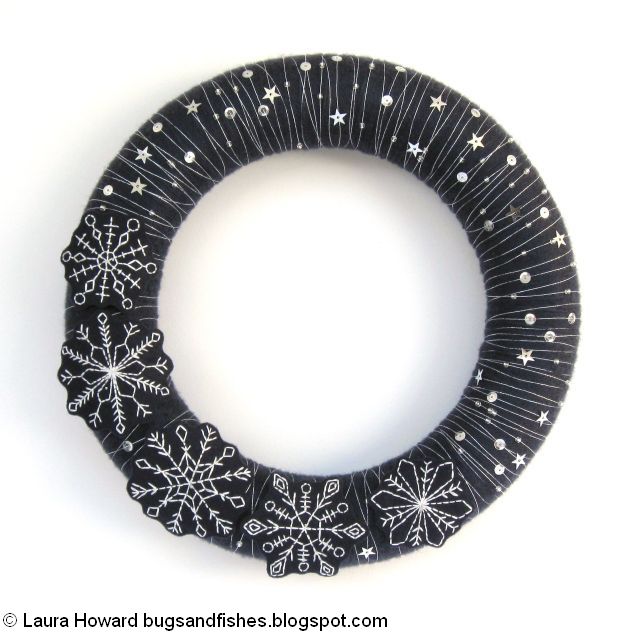wreath decorated with beads and sequins and silver thread